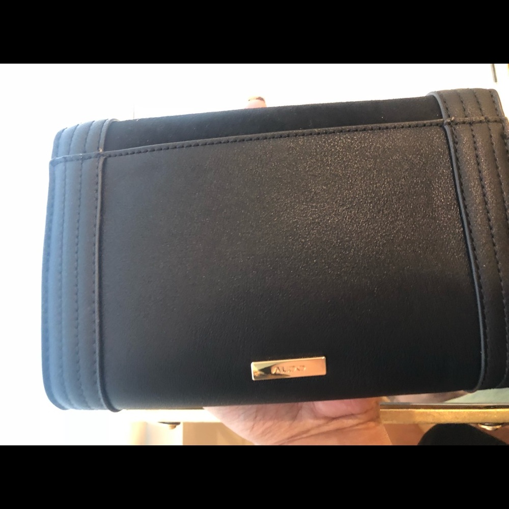 Black clutch with gold chain